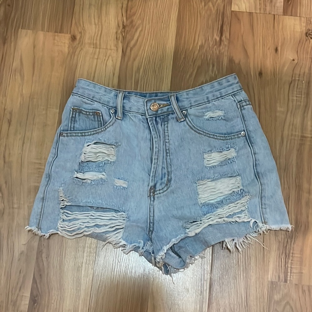 Blue ripped jean shorts